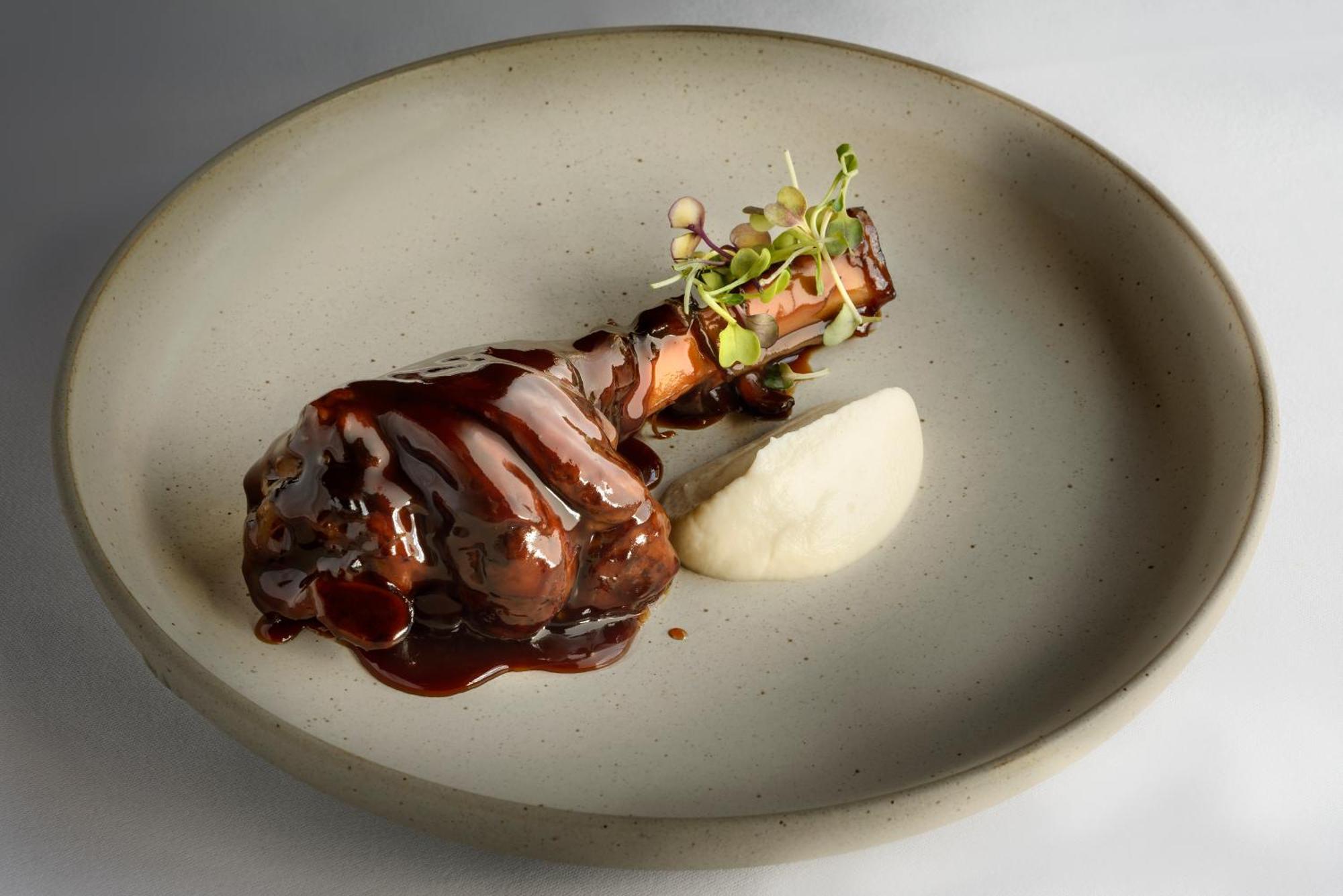 Hotel & Spa Monasterio De Boltaña Exterior foto A duck confit prepared by the restaurant